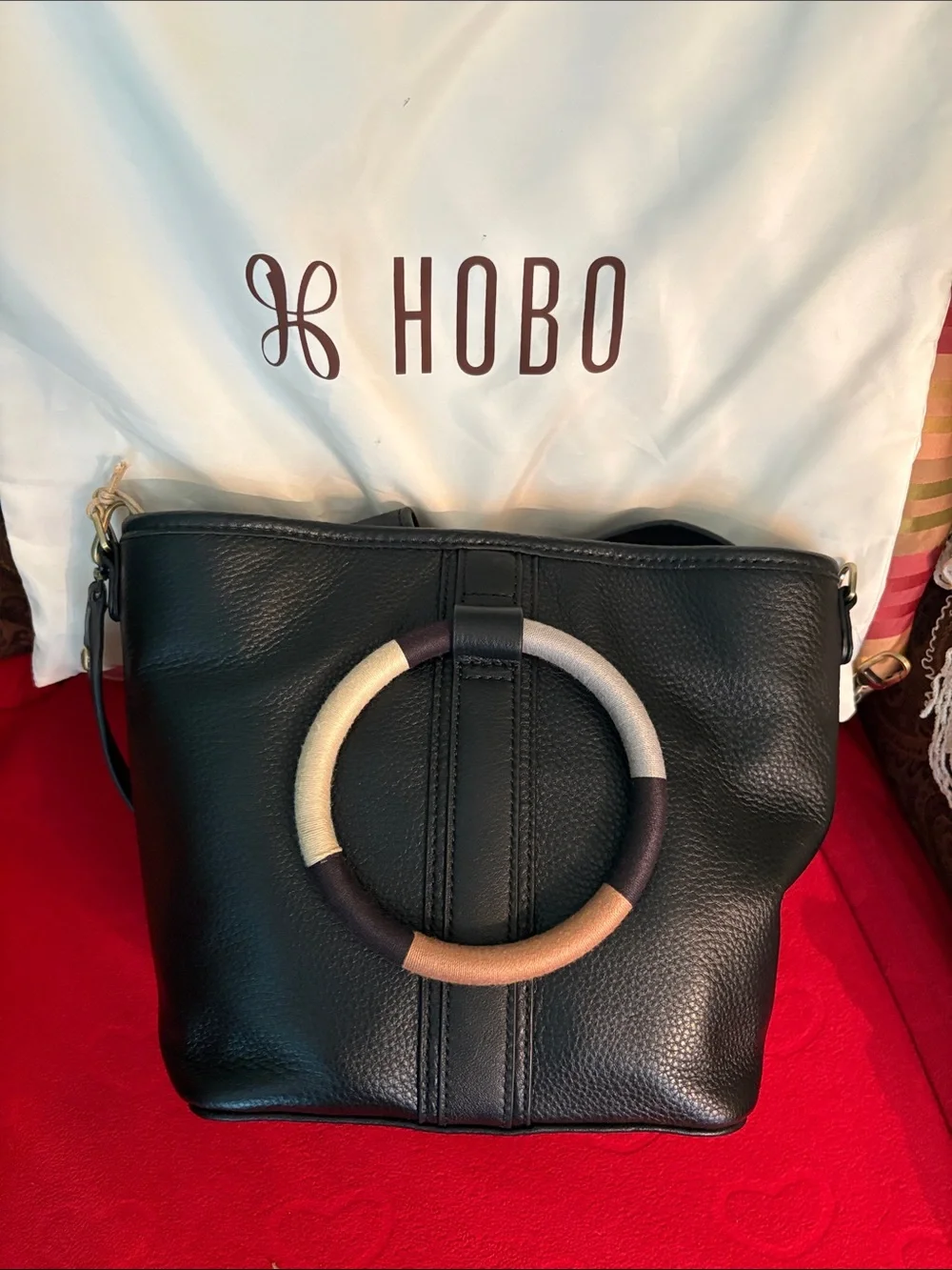 HOBO Black Pebbled Leather Hobo with Multicolor Ring Accent